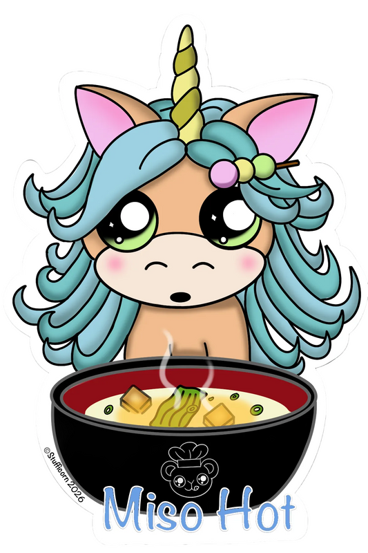 Cartoon unicorn with teal hair and pink ears sitting next to a bowl of miso soup.