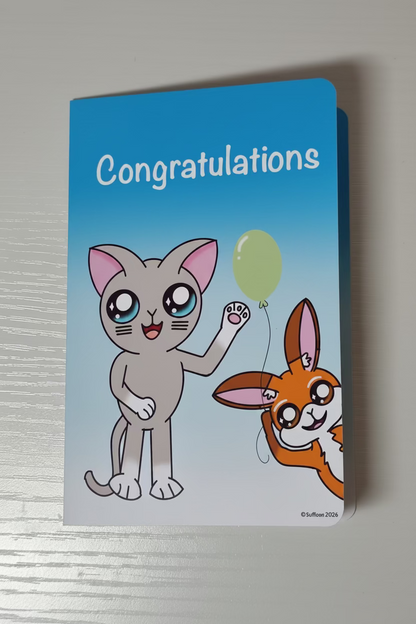 A card with a gray cat and a orange and brown fox holding a green balloon with a blue background that says congratulations.