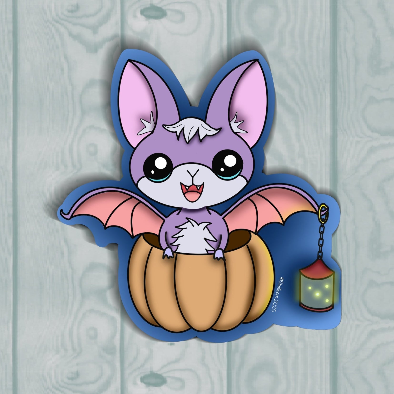 Cartoon bat character with pink wings and white fur sitting on a pumpkin against a light blue wooden background.