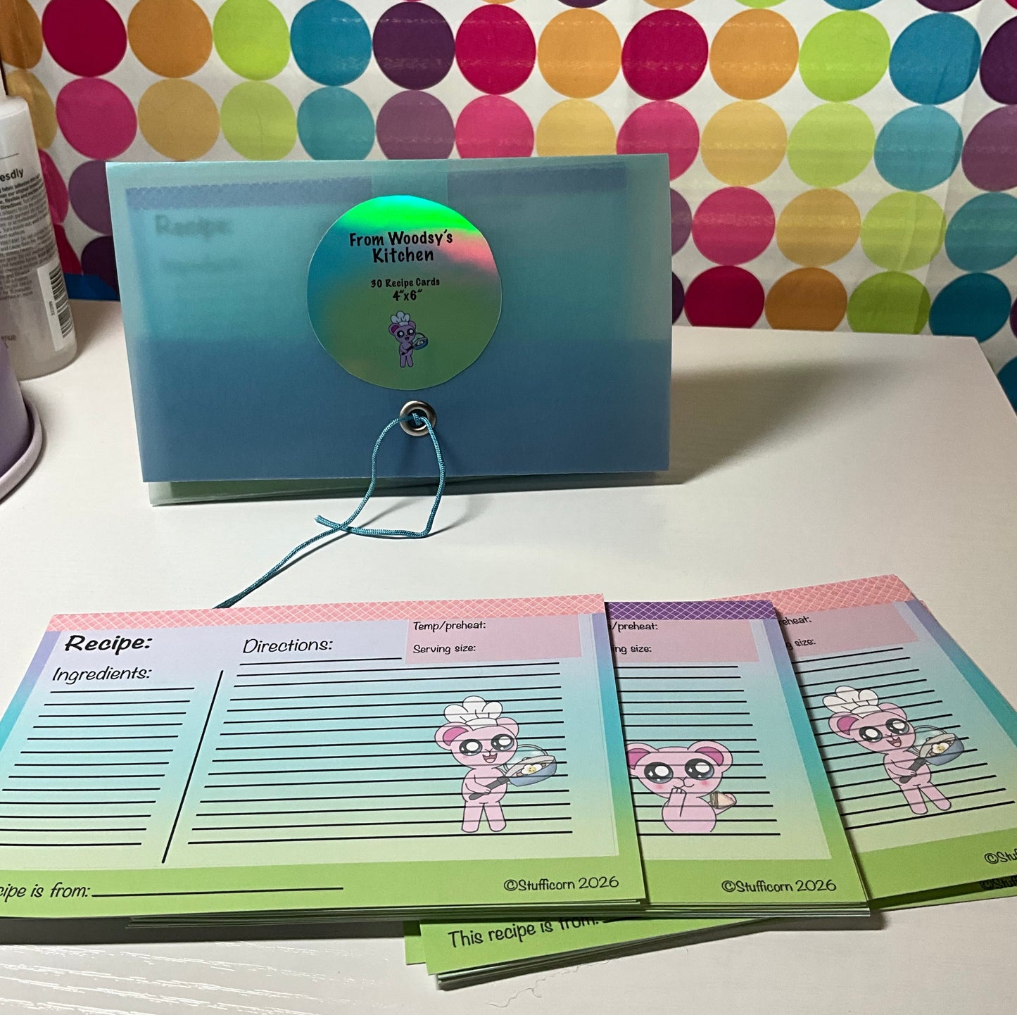 Colorful recipe cards with a blue folder to keep them in.